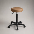 Sgabello da ufficio girevole con ruote, altezza regolabile 45-57 cm, seduta rotonda in pelle sintetica marrone Ø 35 cm
